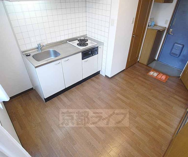 京都府京都市西京区桂上野西町の賃貸マンションの居間