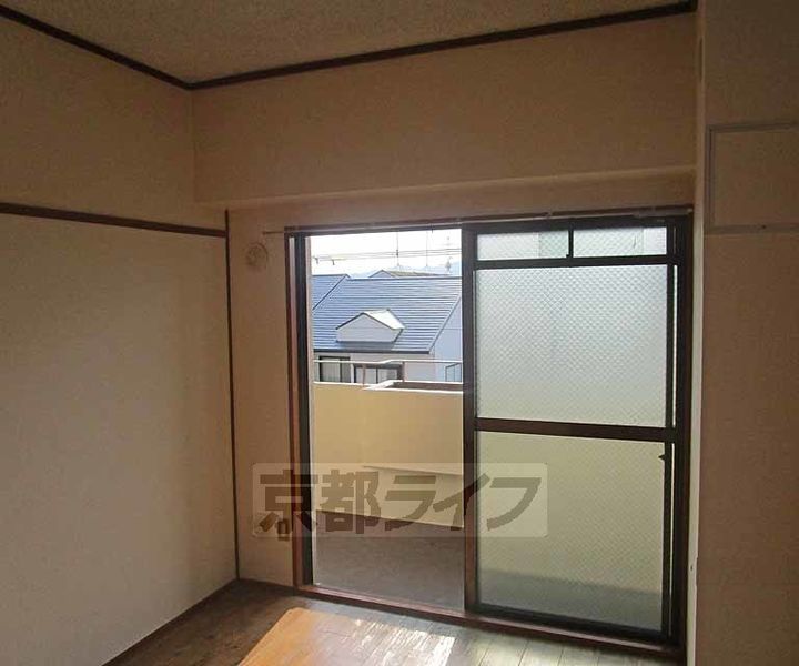 京都府京都市西京区桂南滝川町の賃貸マンションの居間