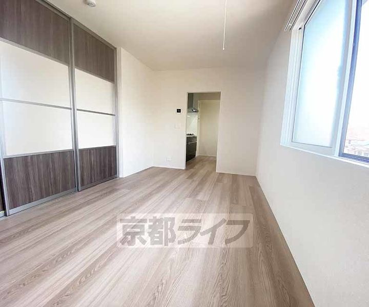 京都府京都市中京区西ノ京池ノ内町の賃貸アパートの居間