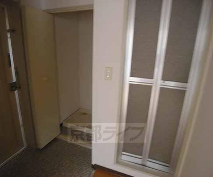 京都府京都市西京区山田北山田町の賃貸マンションの居間