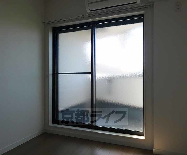 セレニティ伏見桃山303の寝室