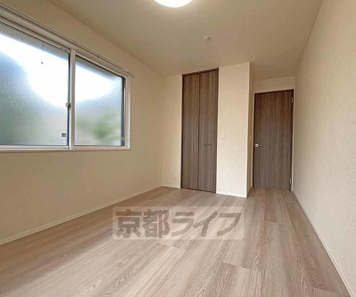 京都府京都市北区大宮北箱ノ井町の賃貸アパートの寝室