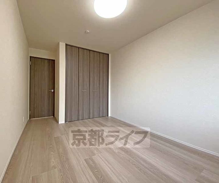 京都府京都市北区大宮北箱ノ井町の賃貸アパートの居間