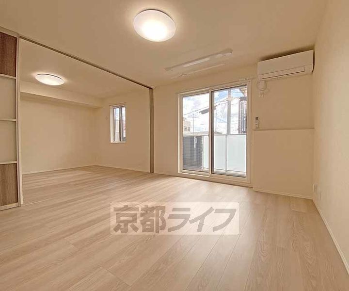 京都府京都市北区大宮北箱ノ井町の賃貸アパートの居間