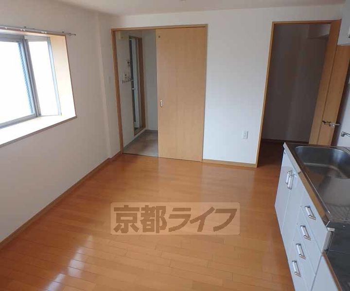 大阪府枚方市田口1丁目の賃貸マンションの居間