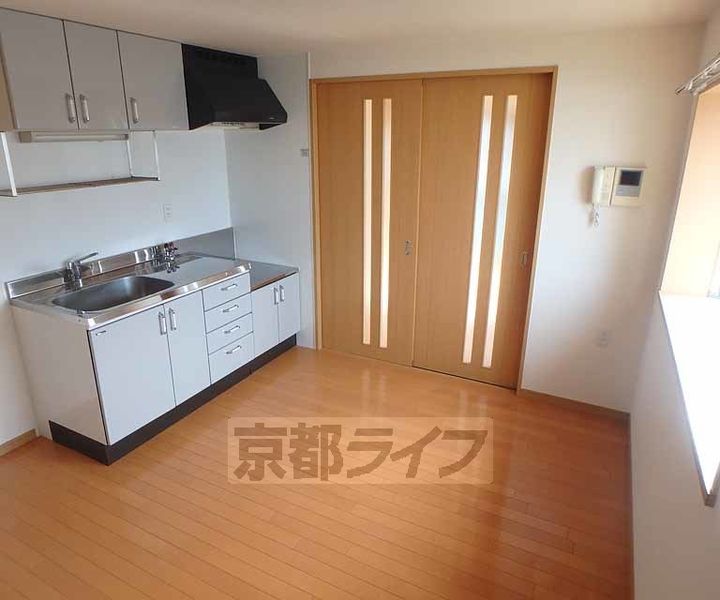 大阪府枚方市田口1丁目の賃貸マンションの居間