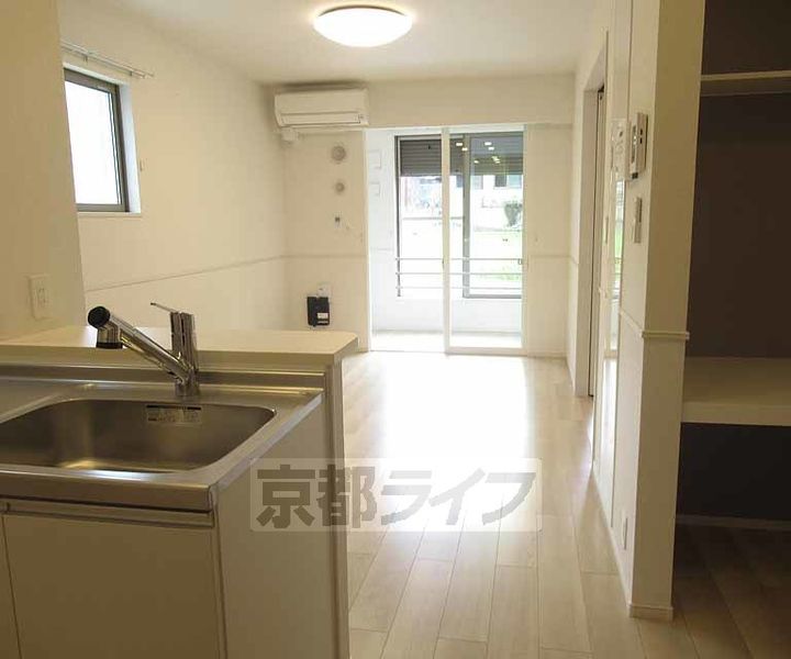 京都府木津川市市坂久保川の賃貸アパートの居間