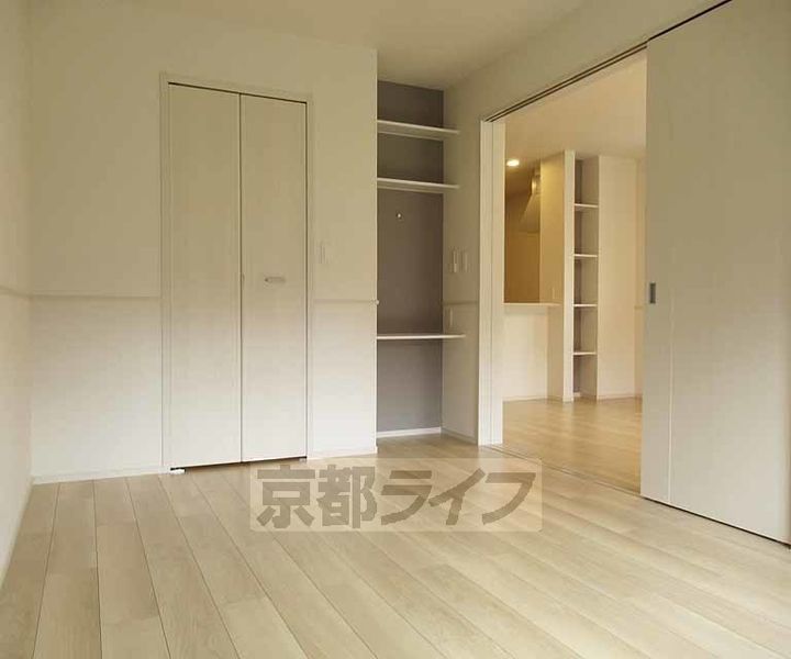 京都府木津川市市坂久保川の賃貸アパートの居間