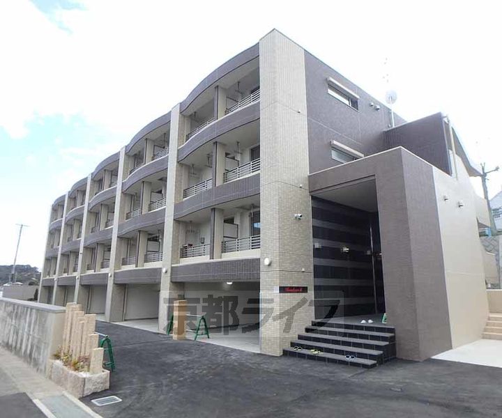 京都府京田辺市薪畠の賃貸マンションの外観
