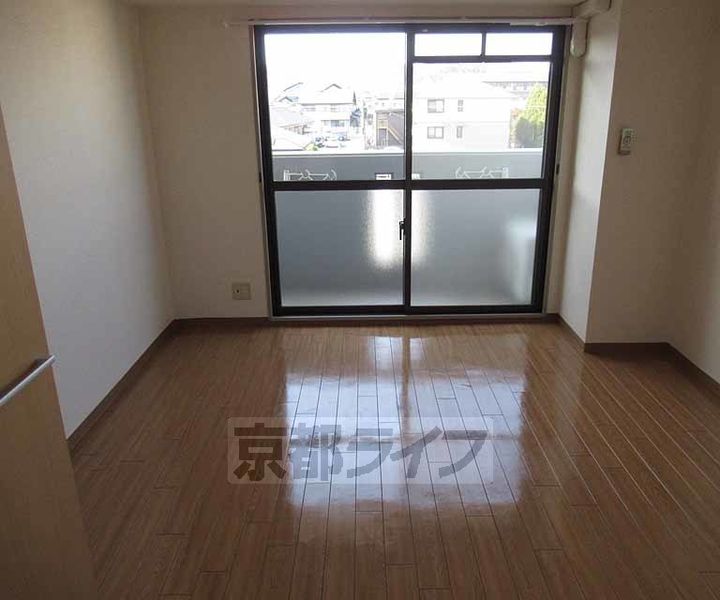 京都府京田辺市田辺鳥本の賃貸マンションの居間