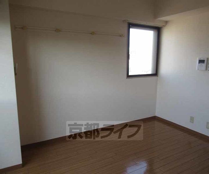 京都府京田辺市田辺鳥本の賃貸マンションの居間