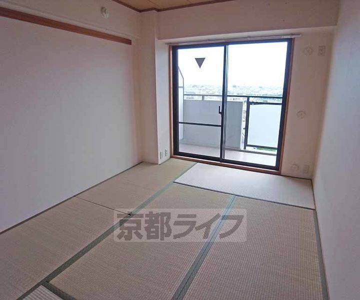 京都府京都市右京区太秦前ノ田町の賃貸マンションの寝室