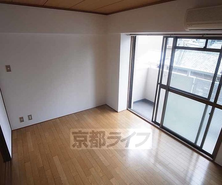 京都府京都市中京区下妙覚寺町の賃貸マンションの寝室