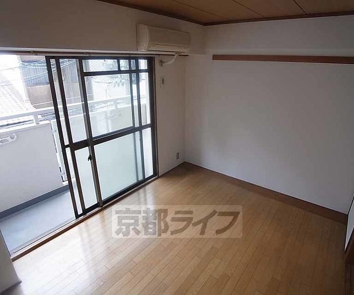 京都府京都市中京区下妙覚寺町の賃貸マンションの寝室