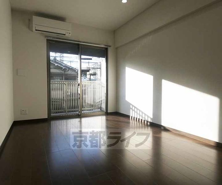 京都府京都市伏見区両替町1丁目の賃貸マンションの居間