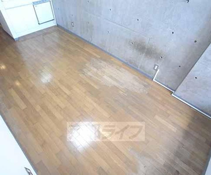 京都府京都市右京区西京極浜ノ本町の賃貸マンションの居間