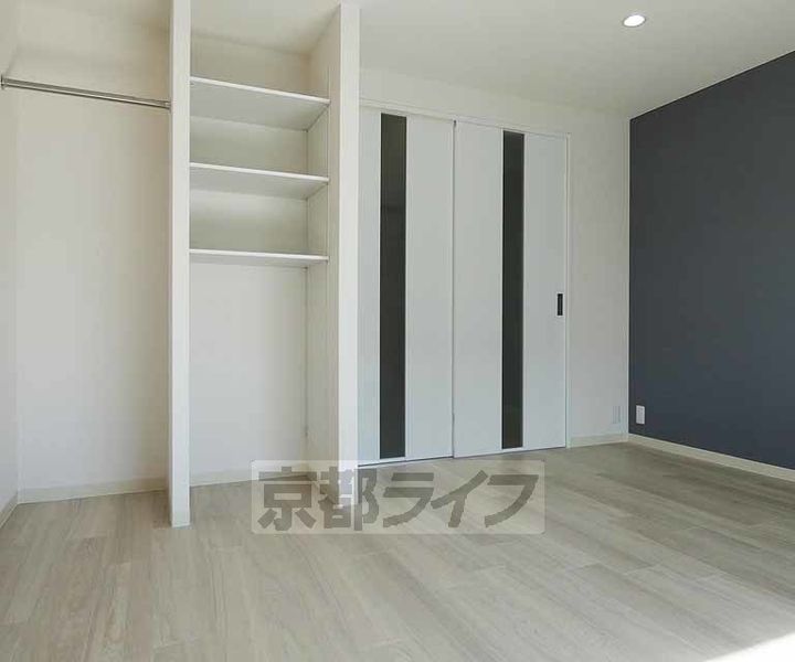 京都府京都市伏見区向島本丸町の賃貸マンションの居間