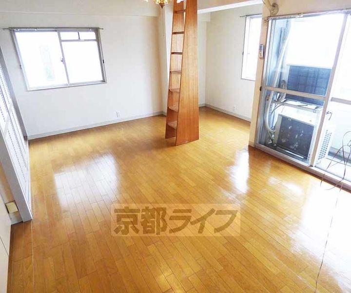 京都府京都市右京区西院乾町の賃貸マンションの寝室