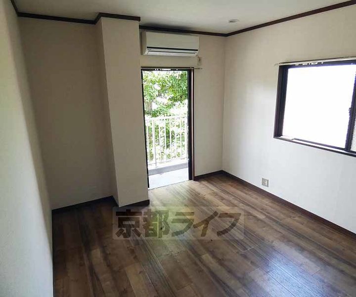 コスモプラザコマツ201の居間