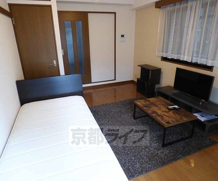 京都府京都市下京区堀川通四条下ル四条堀川町の賃貸マンションの居間