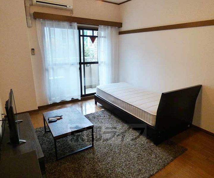 京都府京都市下京区堀川通四条下ル四条堀川町の賃貸マンションの居間