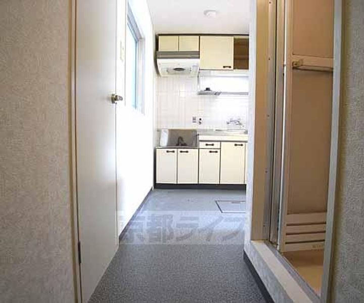 京都府京都市伏見区深草直違橋8丁目の賃貸マンションの居間