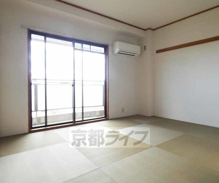 京都府京都市伏見区深草善導寺町の賃貸マンションの居間