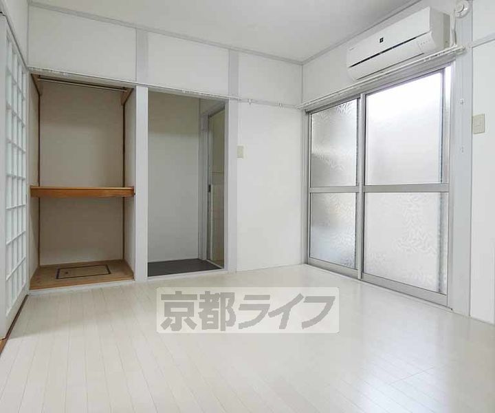 京都府京都市伏見区向島立河原町の賃貸アパートの居間
