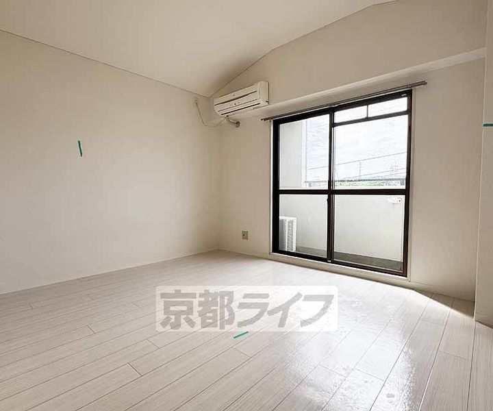 京都府京都市伏見区竹田中島町の賃貸マンションの居間