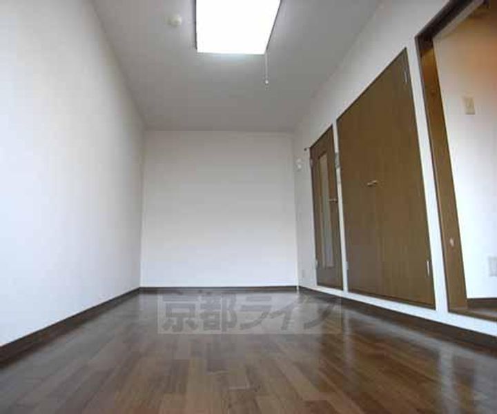 京都府京都市伏見区新町11丁目の賃貸マンションの居間