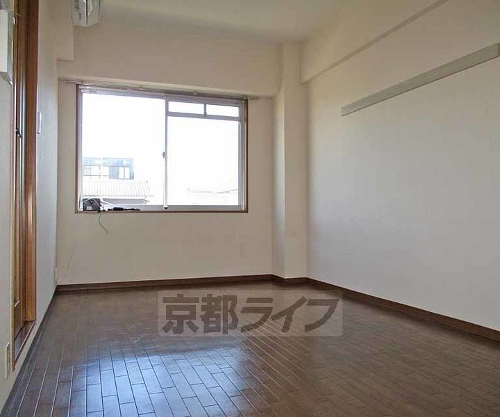 京都府宇治市槇島町三十五の賃貸マンションの居間