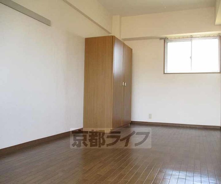 京都府宇治市槇島町三十五の賃貸マンションの居間