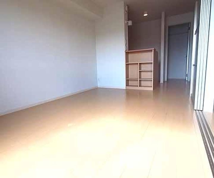 京都府京都市西京区牛ヶ瀬川原口町の賃貸アパートの居間