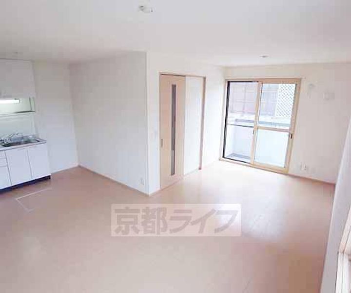 京都府京都市伏見区羽束師菱川町の賃貸アパートの居間