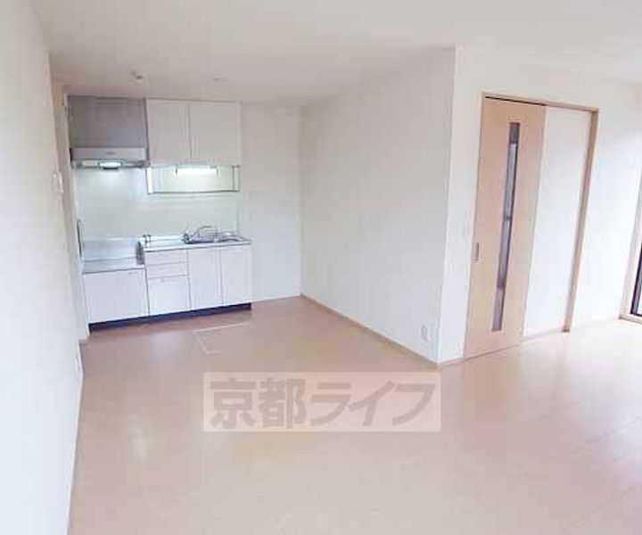 京都府京都市伏見区羽束師菱川町の賃貸アパートの居間