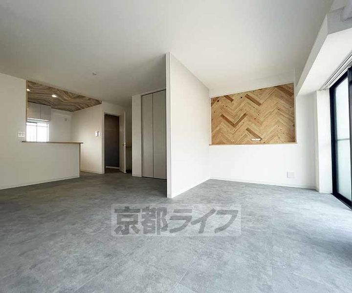 京都府京都市下京区七条御所ノ内西町の賃貸マンションの居間