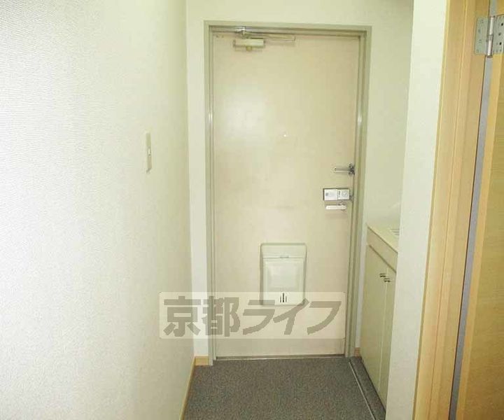 久御山ファーストマンション203の玄関
