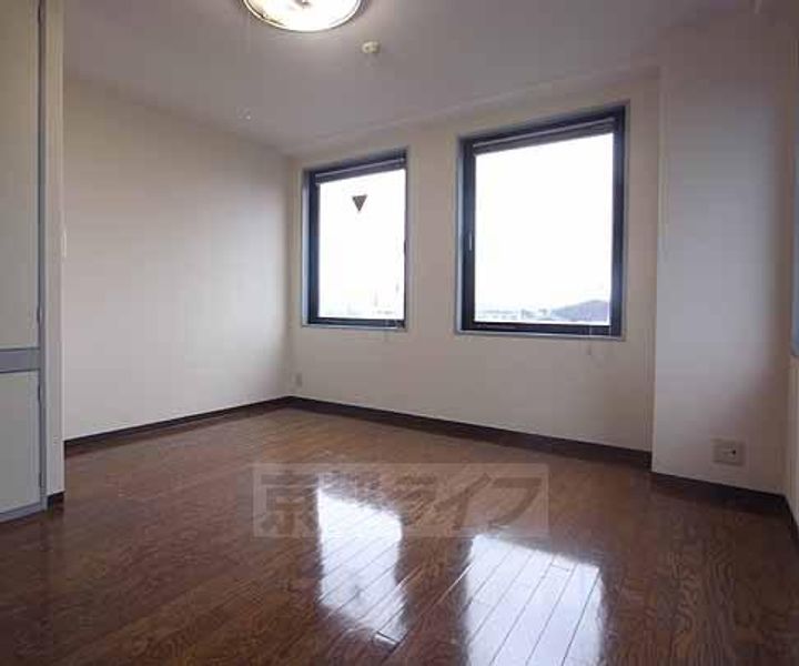 京都府宇治市槇島町三十五の賃貸マンションの居間