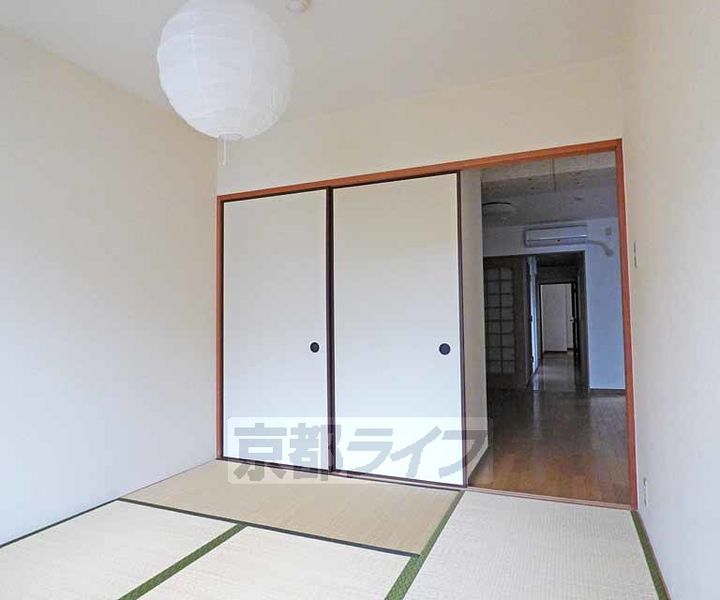 京都府京都市上京区中立売通千本東入丹波屋町の賃貸マンションの居間