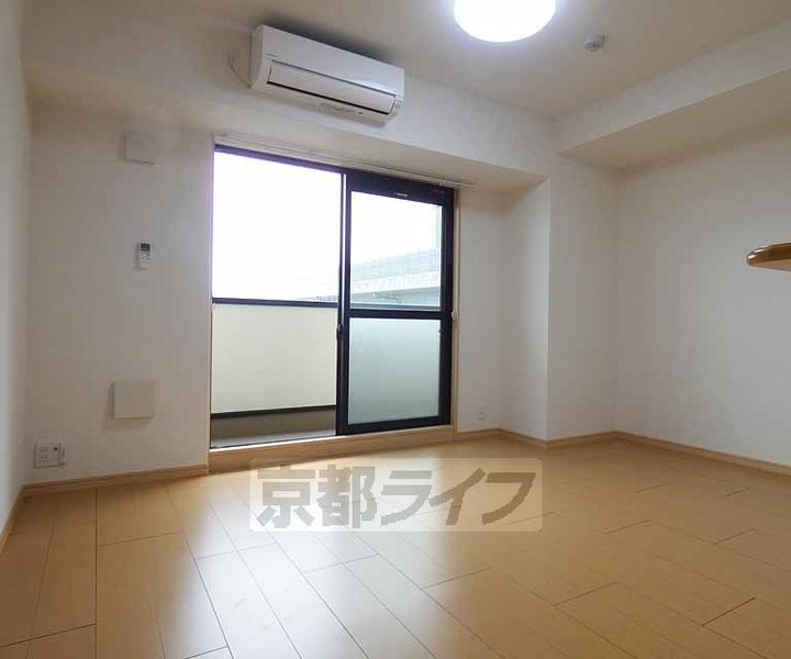 京都府京都市伏見区竹田藁屋町の賃貸マンションの居間