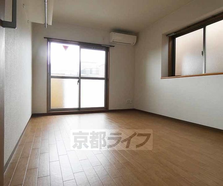 京都府京都市伏見区深草西浦町3丁目の賃貸マンションの居間