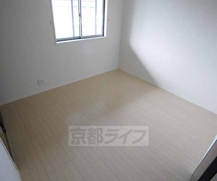 京都府京都市西京区桂久方町の賃貸アパートの居間