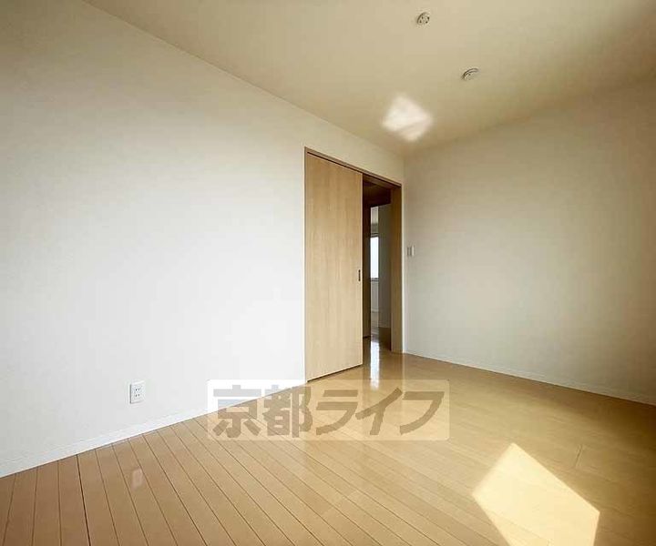 京都府長岡京市井ノ内南内畑の賃貸アパートの居間