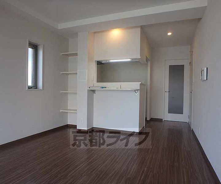 京都府京都市左京区吉田上阿達町の賃貸マンションの居間