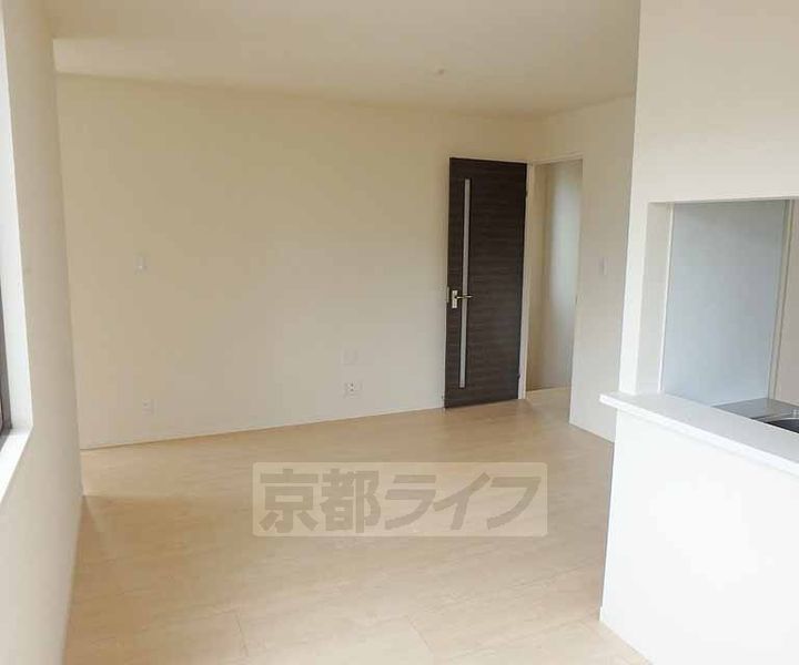 ファミール西村203の居間