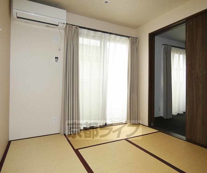 京都府京都市伏見区深草綿森町の賃貸マンションの居間