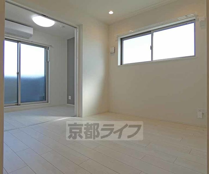 京都府京都市伏見区深草坊町の賃貸アパートの居間