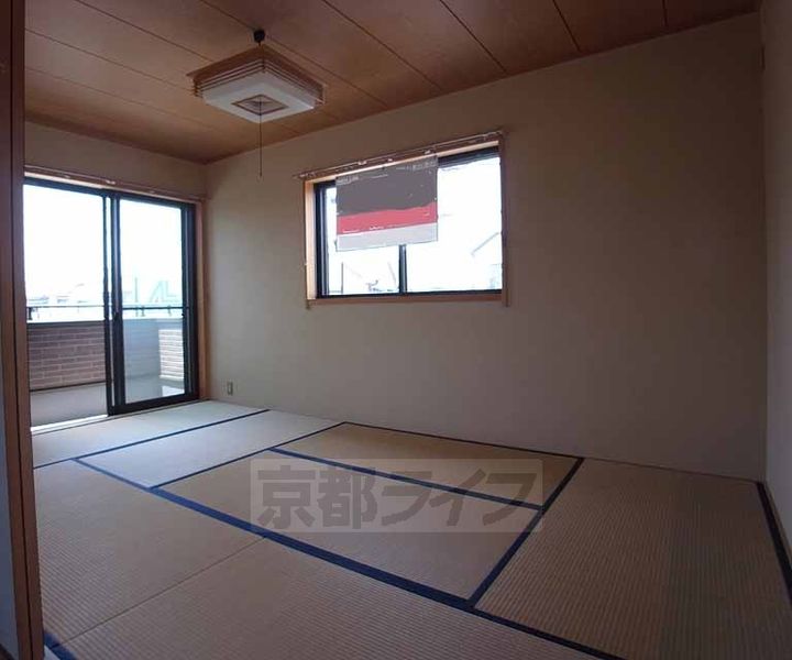 京都府宇治市莵道平町の賃貸アパートの居間