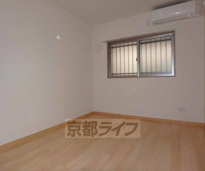 京都府宇治市宇治弐番の賃貸マンションの居間