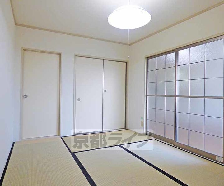 京都府京都市北区衣笠御所ノ内町の賃貸アパートの居間